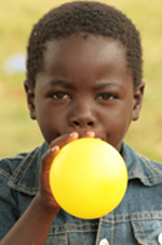 African Boy with Balloon